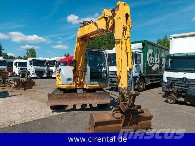 New Holland E70SR 4 Ekskavaatorlaadurid
