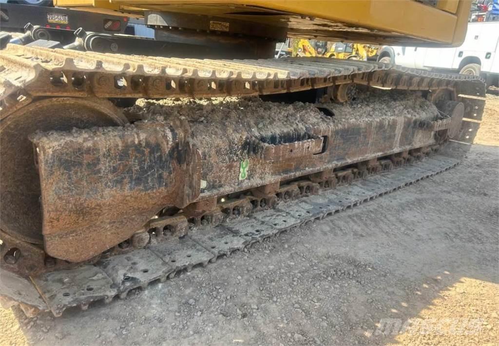 CAT 310 Roomikekskavaatorid