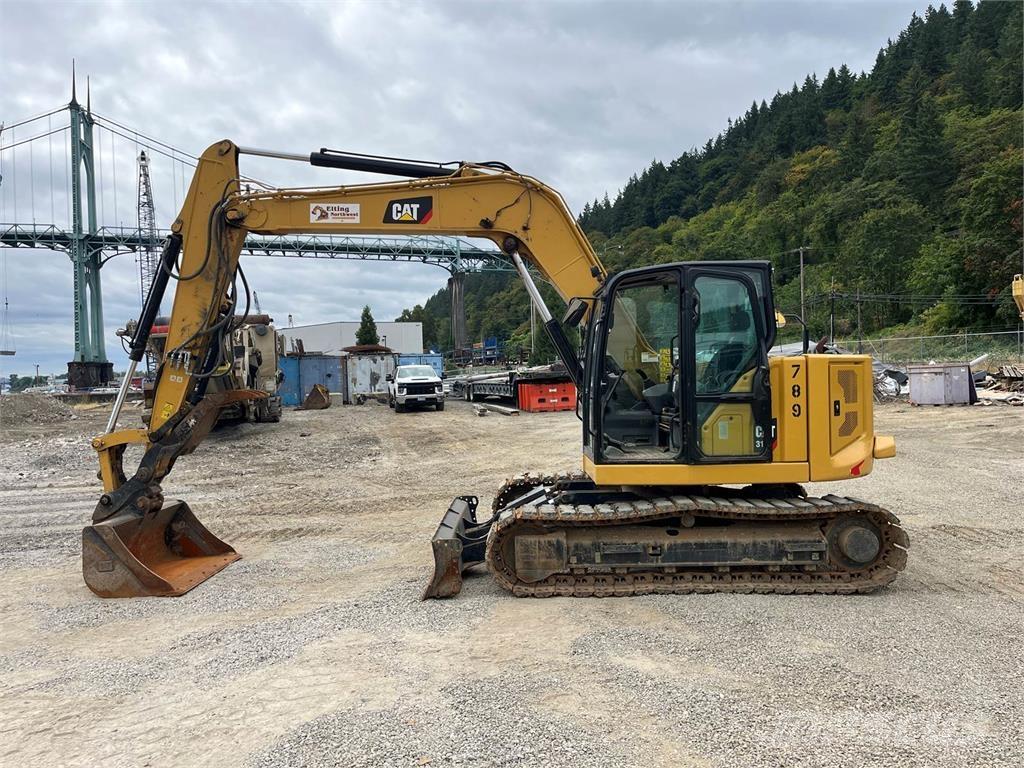 CAT 310 Roomikekskavaatorid
