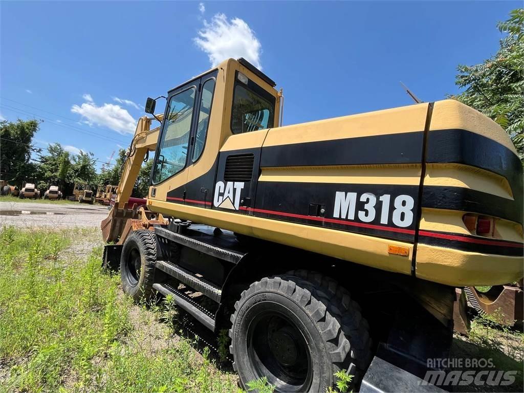 CAT M318 Ratasekskavaatorid