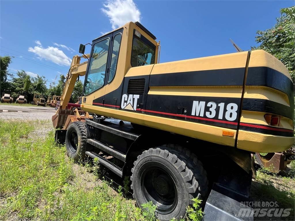 CAT M318 Ratasekskavaatorid