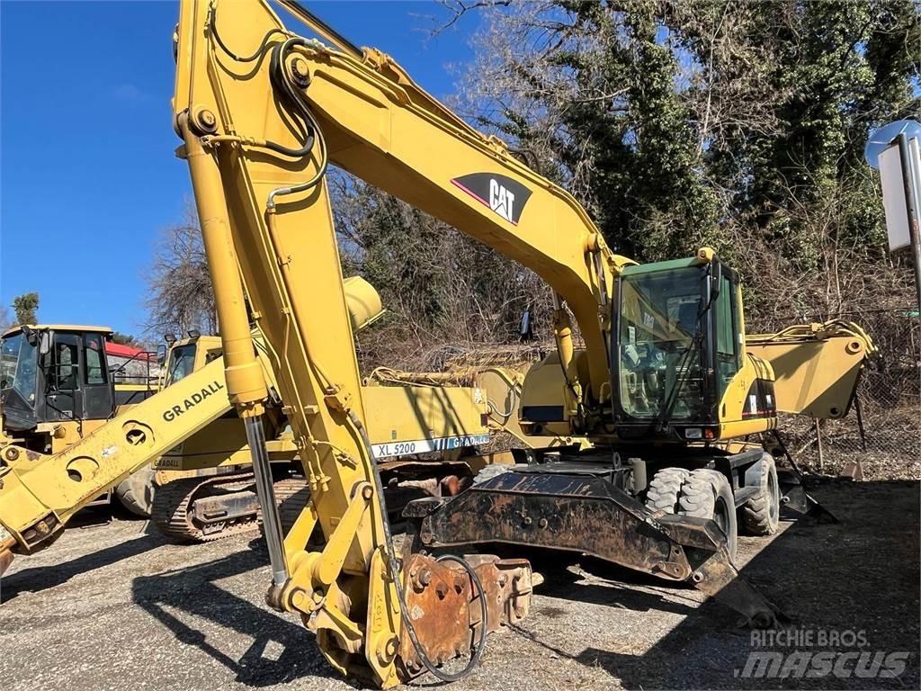 CAT M318C Ratasekskavaatorid