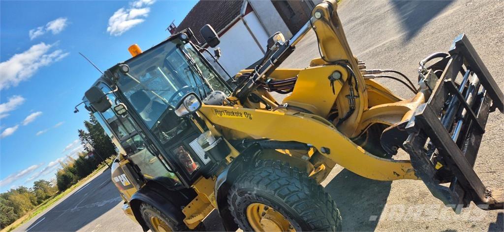 CAT 906M Rataslaadurid