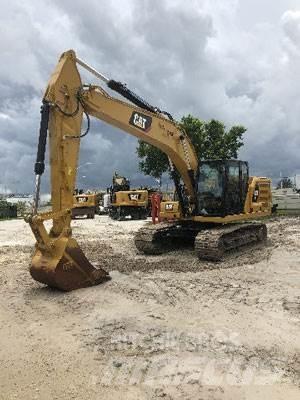 CAT 320 Roomikekskavaatorid