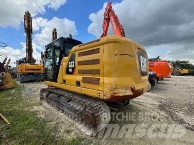 CAT 320 Roomikekskavaatorid