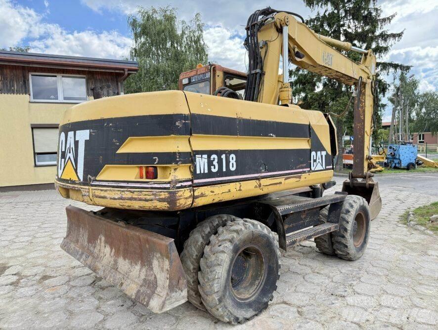 CAT M318 Ratasekskavaatorid