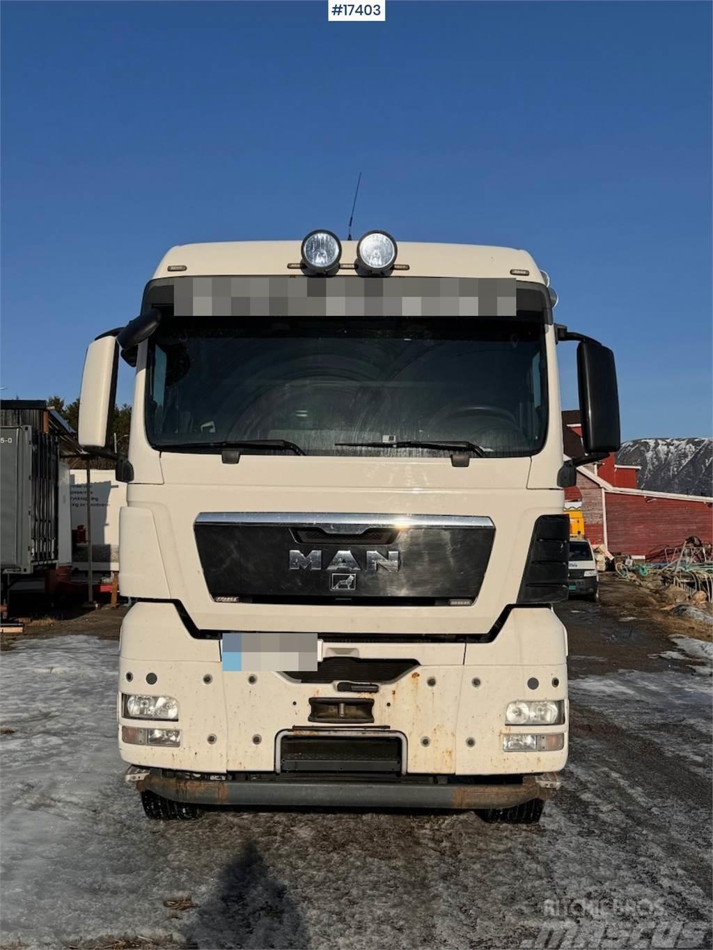 MAN TGX 35.480 8x4 flatbed truck w/ driving bridges Madelautod